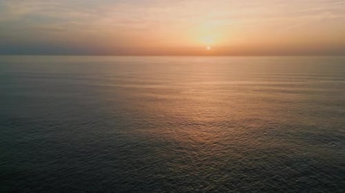 Ocean Surface Reflecting Sun Morning Super Slow Motion. Aerial View Calm Sea Waves Rippling at Su...