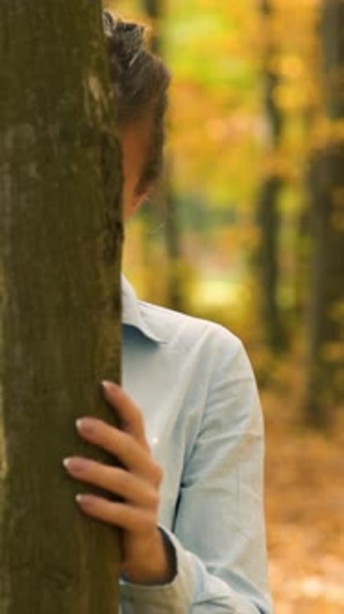Autumn woman in autumn park. Autumn woman in autumn park. Warm sunny weather. Fall concept