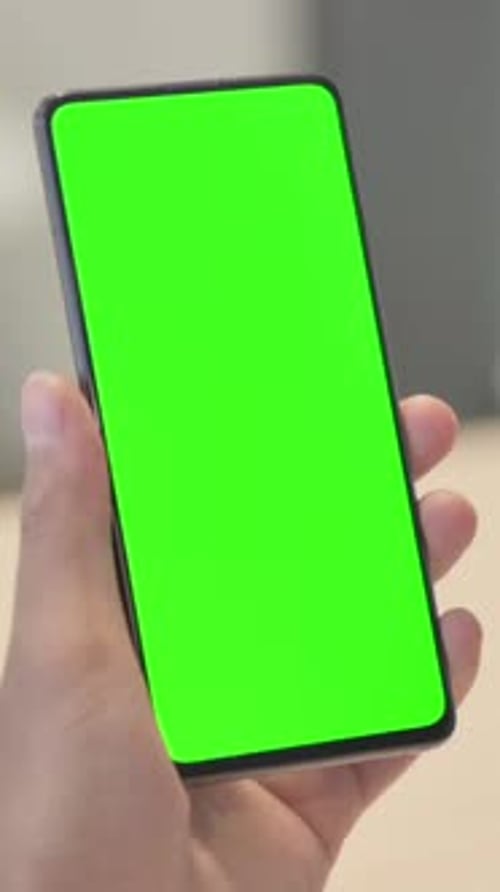 Close up of Male Hand Using Smartphone with Chroma Key, Vertical Video
