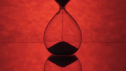 Sand Falls Into the Hourglass