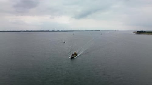 Aerial view of boat sailing on a river