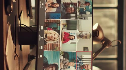 People in a Video Conference on Computer Monitor