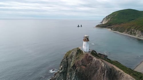 Aerial View of an Old Lighthouse on the Cliff on Pacific Coast Beautiful Panoramic Seascape