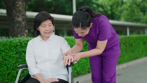 Nurse support elderly woman with in park for healthcare, trust and care in retirement. Caregiver tal