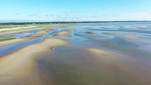 Cape Cod Bay Aerial Drone Footage of Bay Side Beach at Low Tide with Sand Dunes and People Walking i
