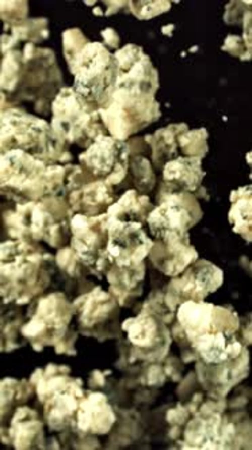 Super Slow Motion Blue Cheese Pieces Filmed on a Highspeed Camera at 1000 Fps