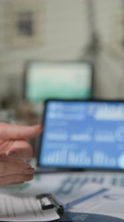 Hands of Colleagues Fist Bumping at Work