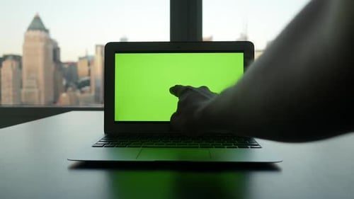 Computer Screen Isolated on GreenScreen Background Chroma Key in City Office