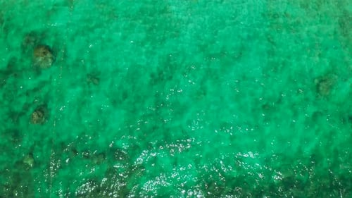 Top View of a Clean Ocean Water Near a Coast