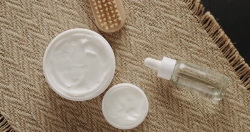 Top Down View of Cream and Beauty Products