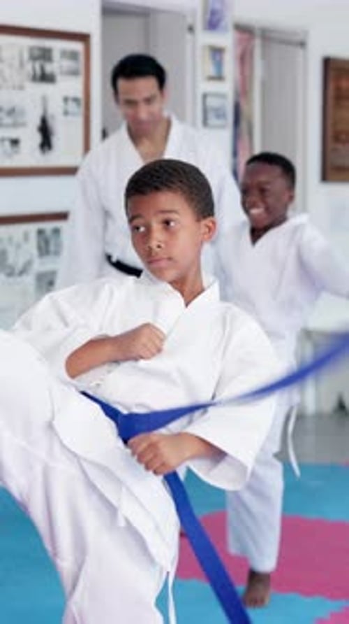 Children Practicing Martial Arts Stances and Techniques