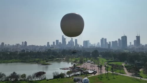 Aerial shot of a hot air balloon over Yarkon Park Tel Aviv, Israel