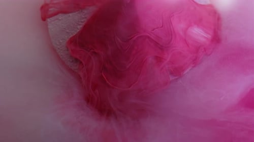 Magenta Ink Swirling Slowly in Water - Abstract Effect