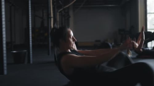 Active Fitness Exercise In Gym Group Of Athletic Women Exercising On Floor Training Abs