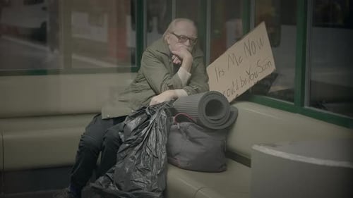 Elderly Homeless Man Suffering From Poverty Looking for Help at Train Station