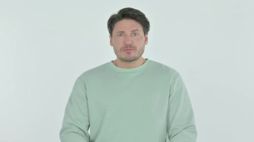 Young Man Asking for Silence on White Background