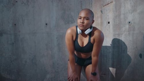 Woman Athlete Resting After Outdoor Workout