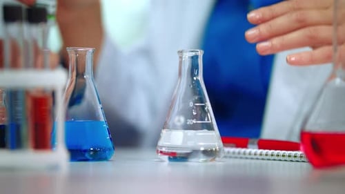 Lab Experiment with Colorful Beakers in Close Up