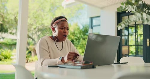 Woman Video Conferencing on Laptop Outdoors