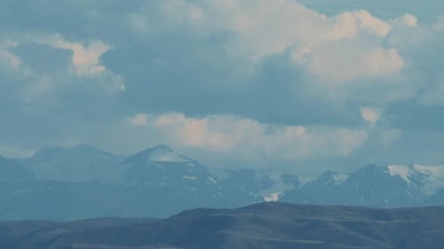 Majestic Mountains with Clouds in Scenic Landscape