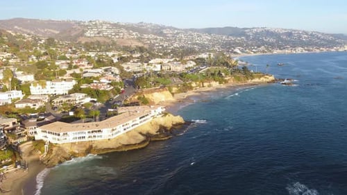 Downtown Laguna Beach, at Sunset. Orange County, Southern California Coast, USA. Drone View of Shore