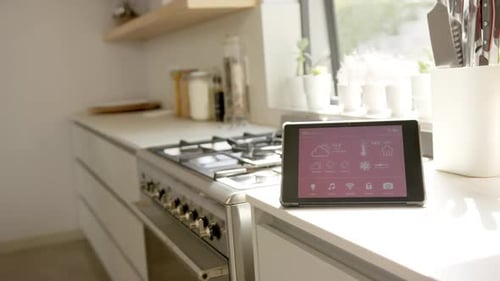 Tablet Controls Smart Home in Modern Kitchen