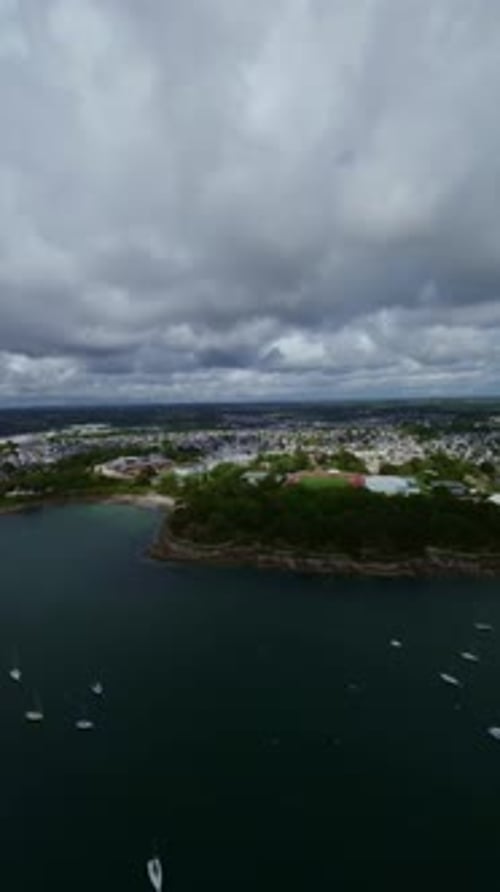 Brittany coastal town aerial view - moody sea harbor