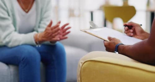 Adults at Therapy Session, Taking Notes