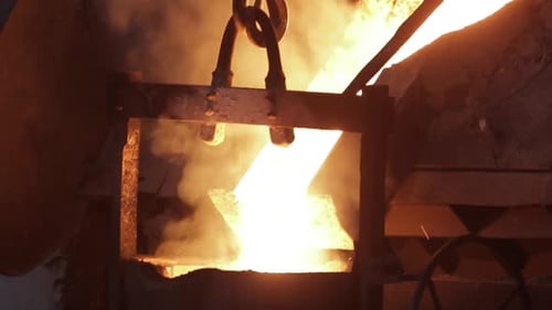 Industrial Molten Steel Pour From Furnace with Intense Heat Sparks in Metalwork Foundry Metallurgy