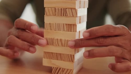 Playing Jenga at Home With Family