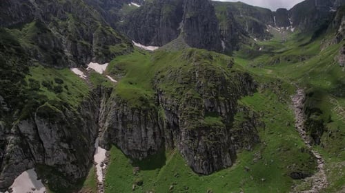 Aerial View of Lush Green Mountain Range