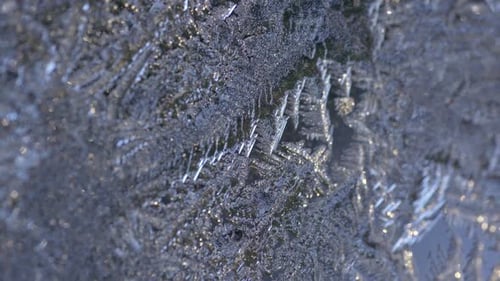 Detailed ice crystals glinting in the light