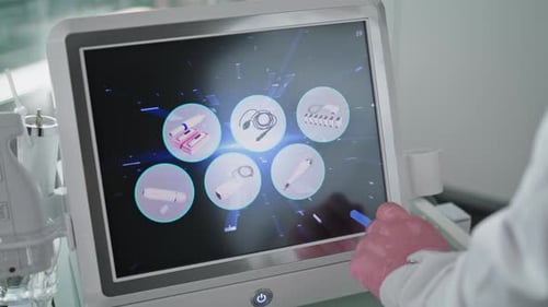 Beautician Touching Device Screen Choosing Mode Rejuvenation Procedure Close Up
