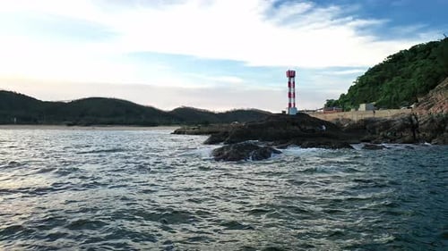 Aerial Top view of a transparent blue sea with beautiful waves at sunny day in summer. air of ocean