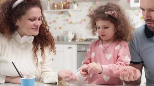 Portrait of Adorable Girl with Curly Hair Celebrating Festive Easter Holidays at Home