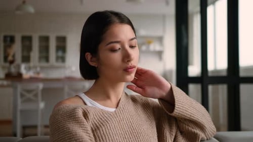 Sad Pensive Hispanic Woman at Home Touching Neck Feeling Pain Health Problem Latina Caucasian Female