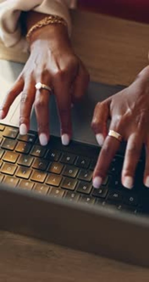 Hands, typing and laptop with working and planning in a home office with a business woman