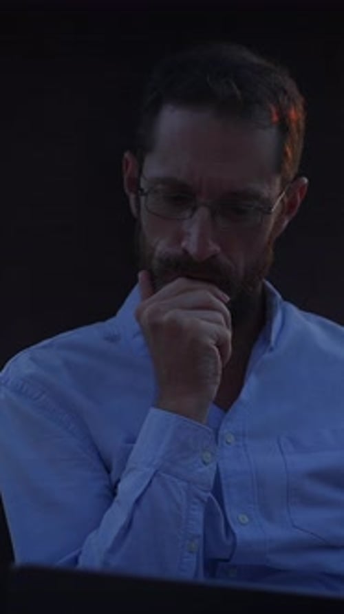 Bearded Man Working on Laptop at Sunrise