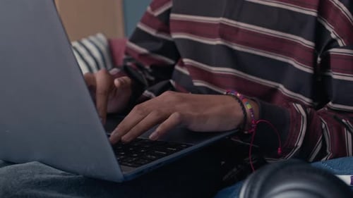Teenage Boy Typing on Laptop when Studying at Home