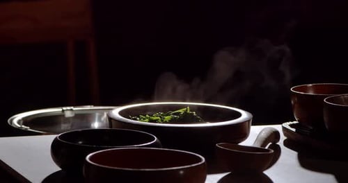 Bowls of Food Steaming on a Table