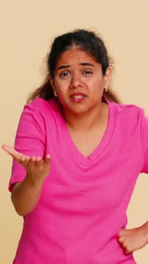 Woman Expressing Disappointment, Frustration, and Confusion in Studio