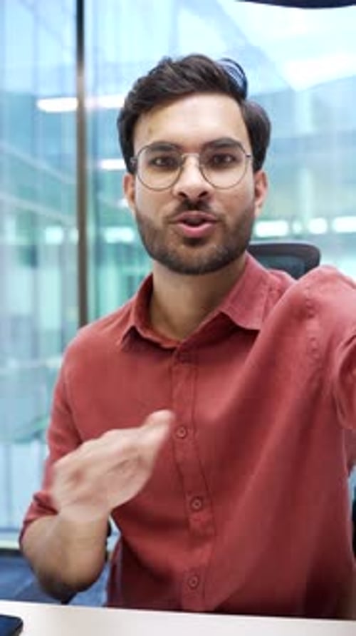 Young Adult Explainer in Modern Office Setting