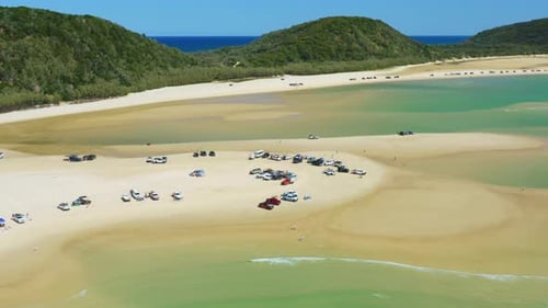 Aerial 4K Drone Above 4wd Cars With Sandy Beach Camping Setup On Australian Turquoise Coast