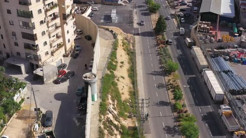 Security wall with Israeli idf watch tower Close to Shuafat Refugee Camp- Aerial