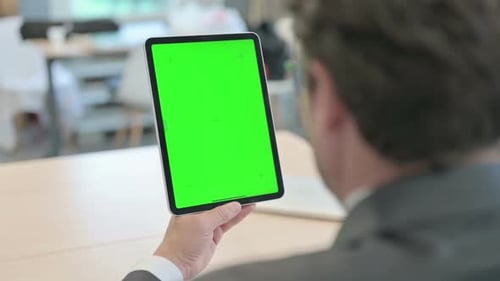 Close Up of Businessman Using Digital Tablet with Green Screen