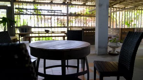 Rustic Indoor Seating Area with Wooden Furniture and Natural Elements