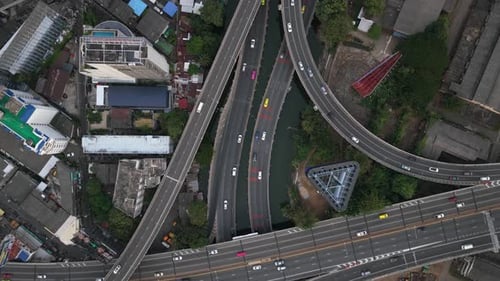 Aerial Top Down View of a Complex Road Junction with Cars and Traffic Urban Transportation
