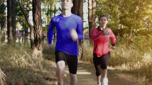 Running Couple on a Trail at Sunrise, Close Up Shoes Steadicam