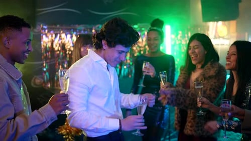 Friends Celebrating at a Party with Champagne Glasses