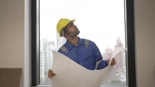 Engineer is working at tower.